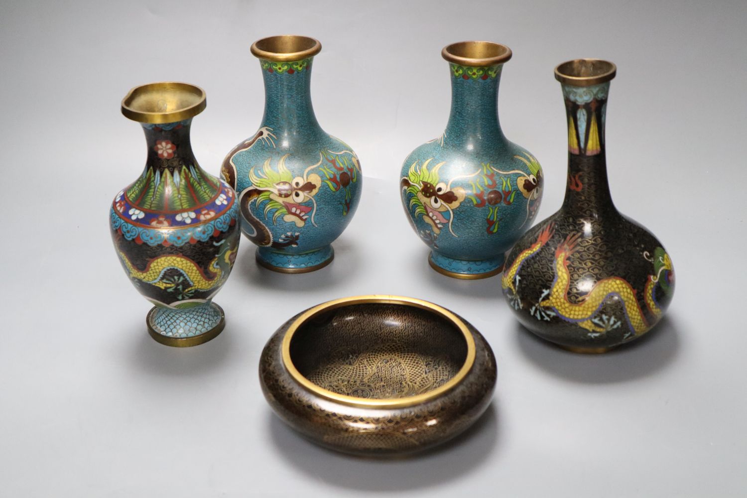 A pair of Chinese cloisonne enamel vases, 17cm and three other cloisonne vessels
